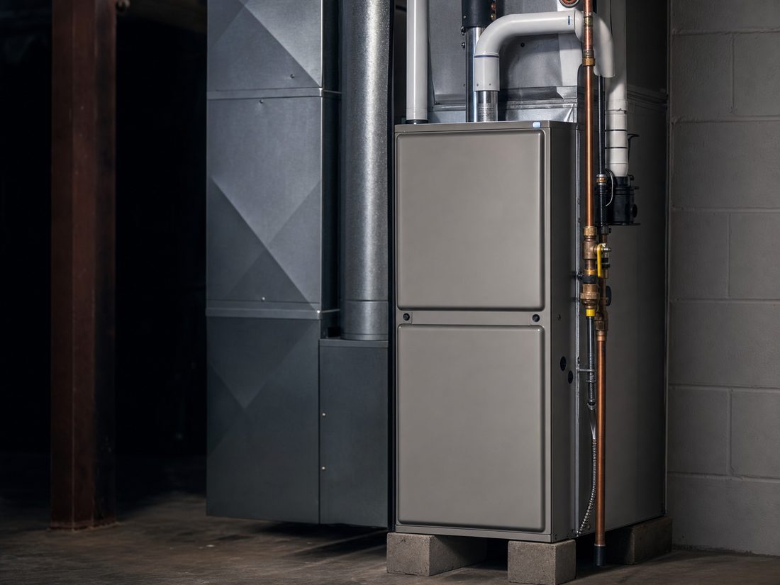 High-efficiency furnace installed in a clean utility room
